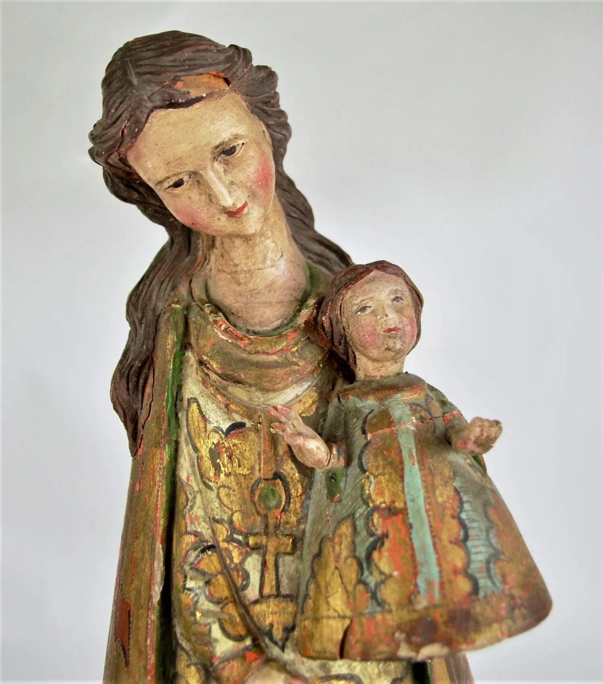 Santos, carved wood figures